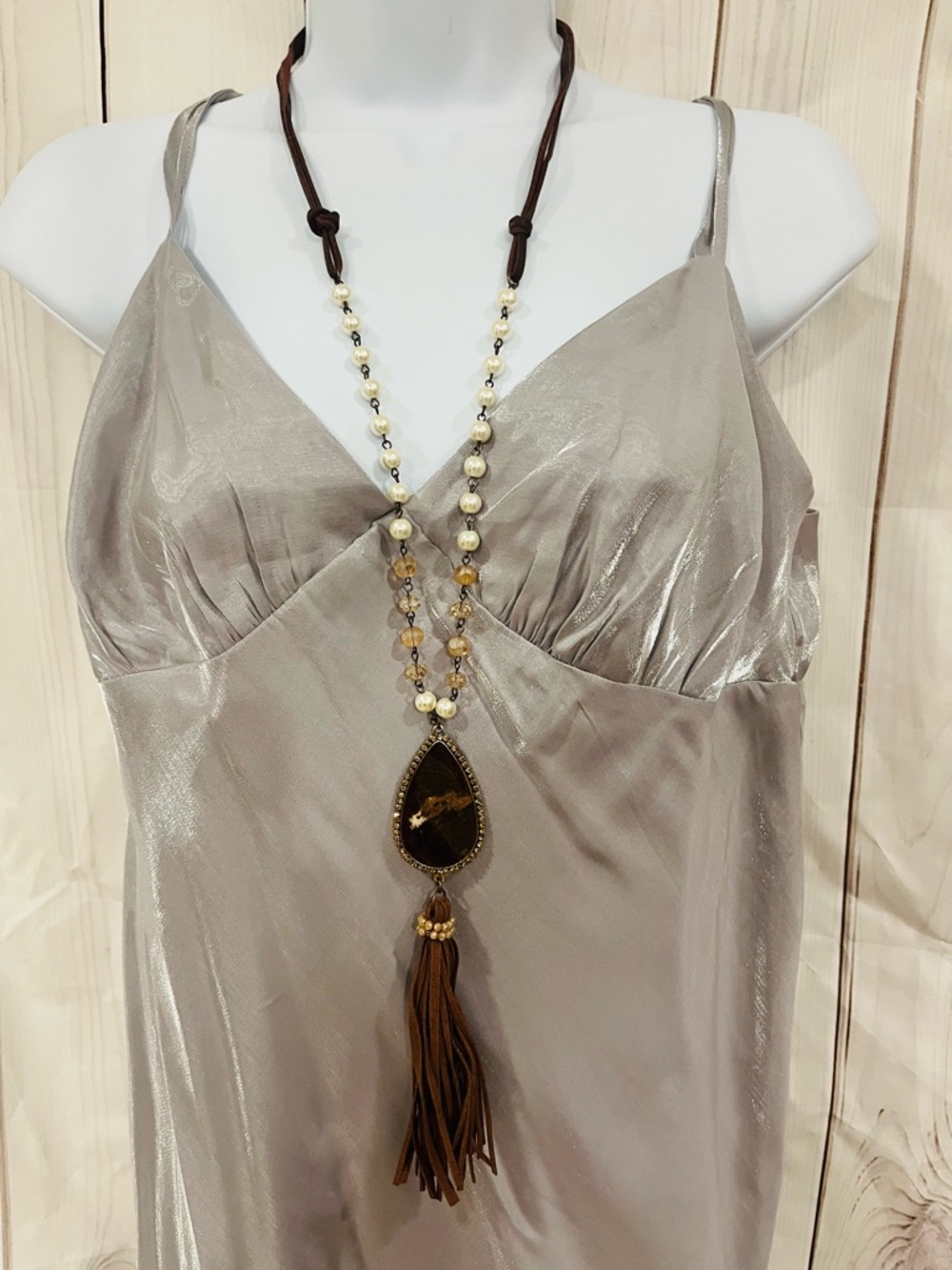 22in Necklace ,Animal Print Pendant with leather strand and tassel, faux pearls.